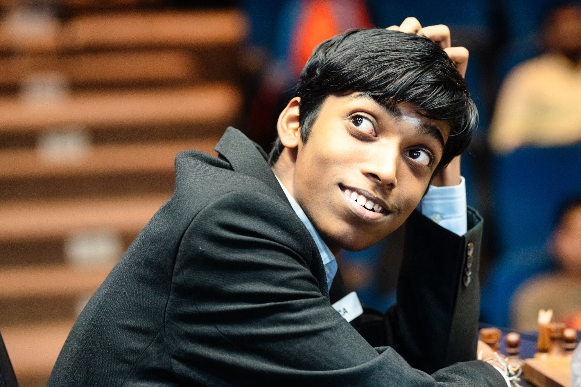 Indian chess prodigy Rameshbabu Praggnanandhaa smiles as his