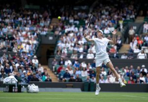 Jannik Sinner in action in Wimbledon 2024