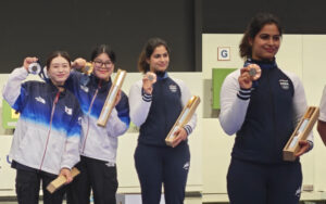 Manu Bhaker at the podium in Paris Olympics with her Bronze medal