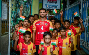 Anwar Ali with kids who are East Bengal supporters