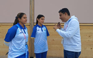 Boria Majumdar with Sheetal Devi and her coach