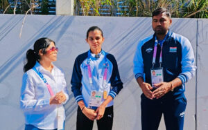 Sharmistha Gooptu with Bhavnaben Choudhary and her coach