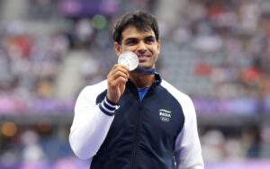 Neeraj Chopra with his Silver medal