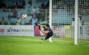 Vishal Kaith with a save during penalty shootout