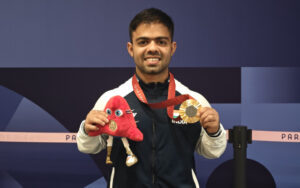 Navdeep Singh with his medal at the Paris Paralympics