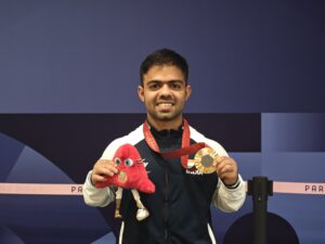 Navdeep Singh with his medal at the Paris Paralympics