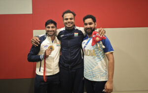 Sumit Antil with coach Arun Kumar (left) and physio, Vipin