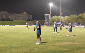 New Zealand Players using baseball gloves