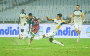 MBSG's Liston Colaco in action CFC's Bikash Yumnam at Vivekananda Yuba Bharati Krirangan Stadium, Kolkata on Saturday