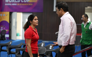 Manu Bhaker talking with Jaspal Rana