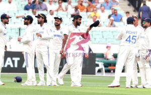 Jasprit Bumrah with his teammates at the MCG