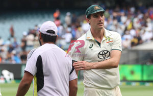 Pat Cummins with Rohit Sharma after MCG win