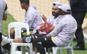 Rohit Sharma with the ice pack on his knee at the MCG nets