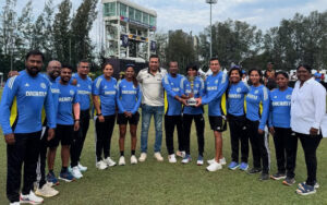 Nooshin Al Khadeer and the rest of the support staff with VVS Laxman after the World Cup win