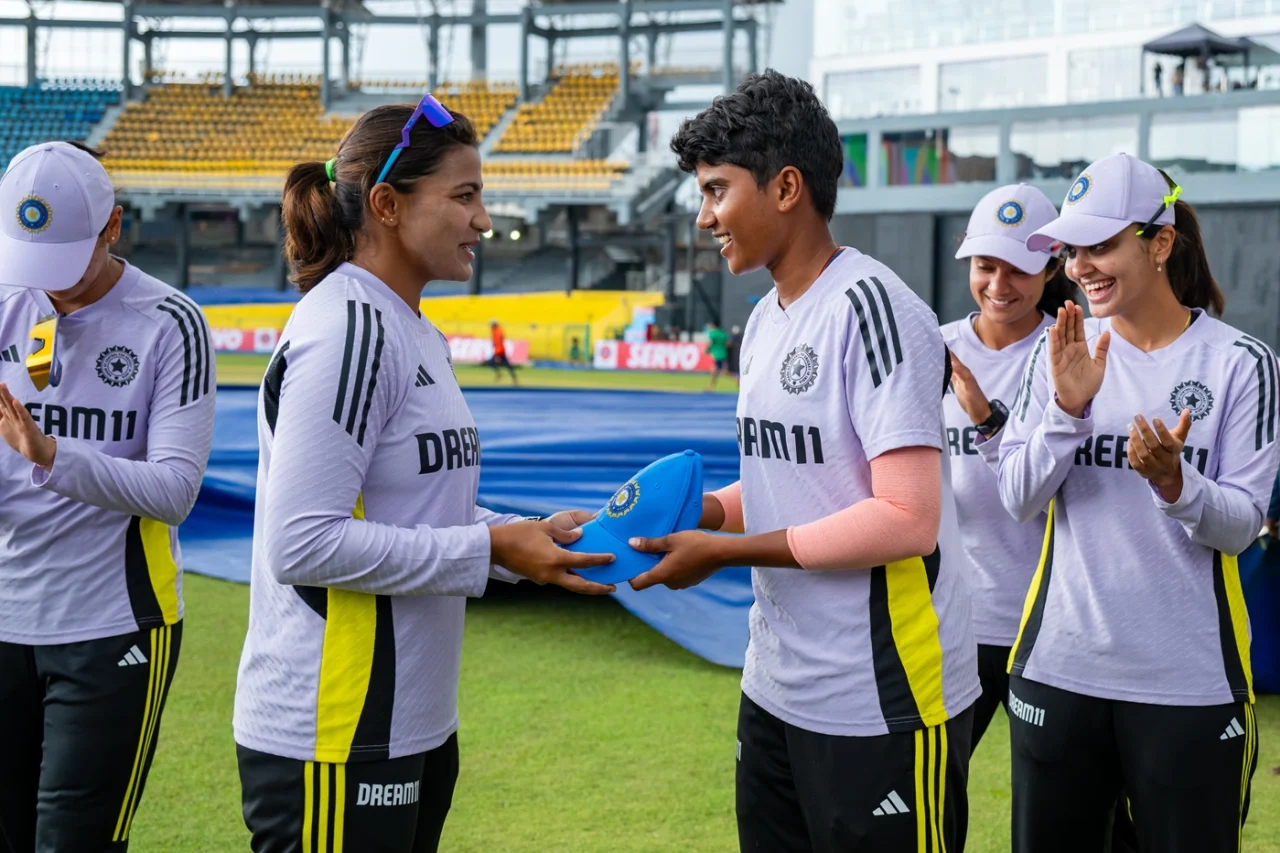 N Shree Charani receives her ODI cap from Sneh Rana