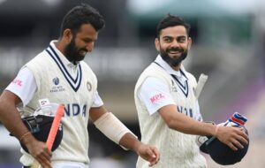 Cheteshwar Pujara with Virat Kohli for Team India