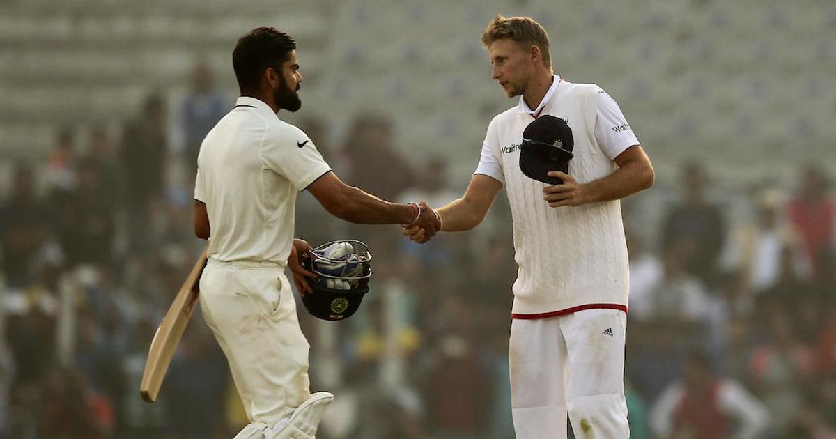 Joe Root with Virat Kohli